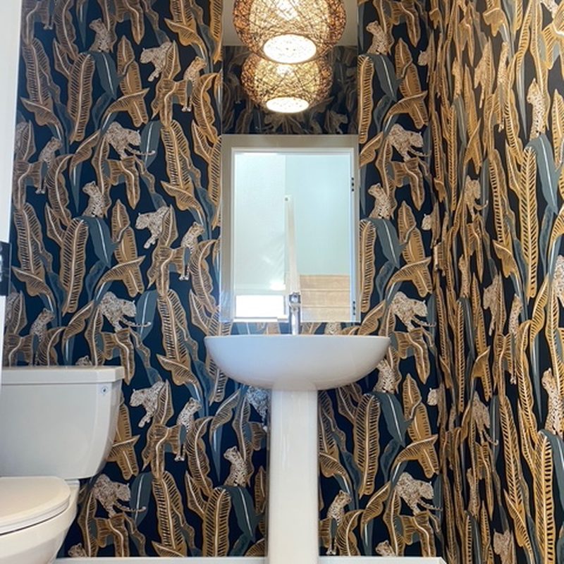 Calgary navy jungle leopard wallpaper installation powder room