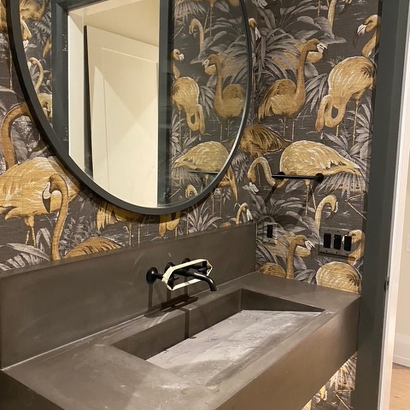 Canmore flamingo wallpaper installation concrete vanity bathroom
