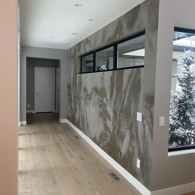 Coldstream abstract feature wall wallpaper installation in a hallway