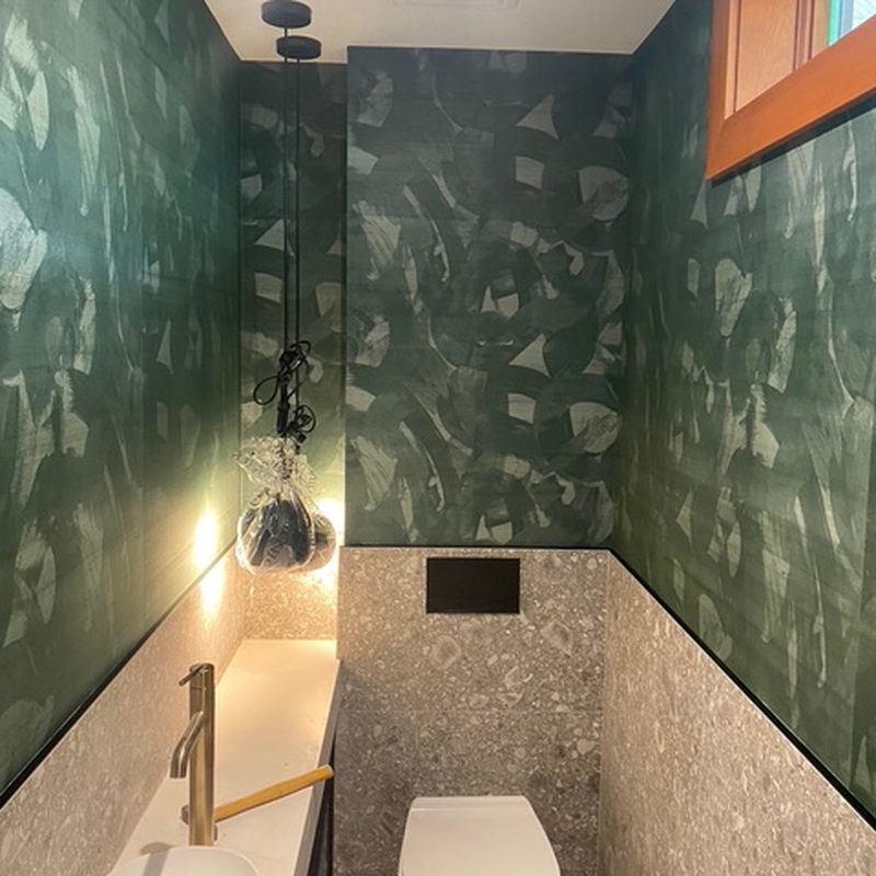 Summerland green abstract wallpaper installation in a powder room