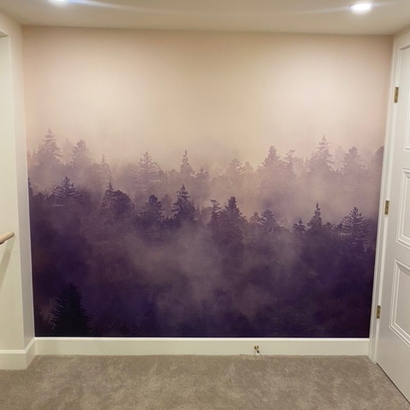 Vernon misty forest mural wallpaper installation in a bedroom
